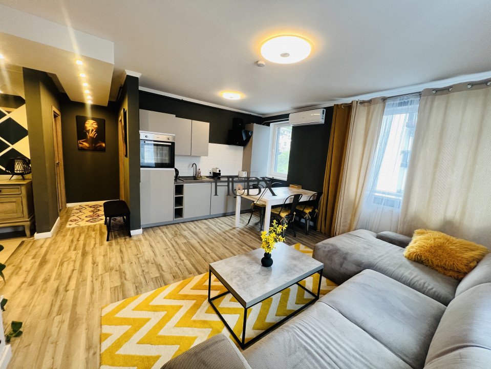 Apartament ultra dotat de 3 camere 60 mp utili plus balcon in zona Teilor
